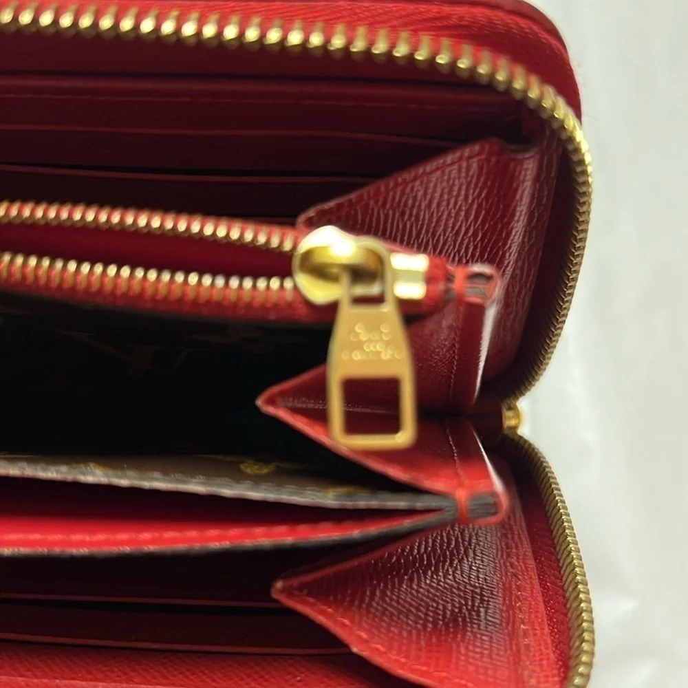 Louis Vuitton Monogram Retiro Cerese Zippy wallet. Comes with COA